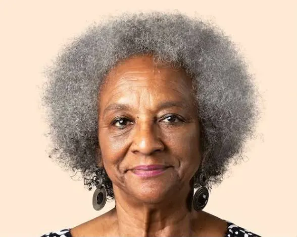 Portrait of an elder, capturing the warmth and grace at the centre of our work.
